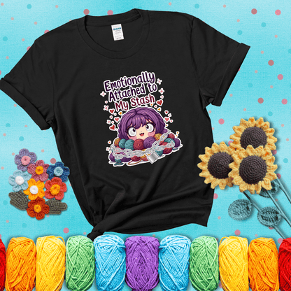 Rows of colorful yarn skeins stacked with playful text. Text reads: “Emotionally Attached to My Stash.” A humorous shirt for fiber lovers with growing collections, showing a black tee with a teal sunflower background