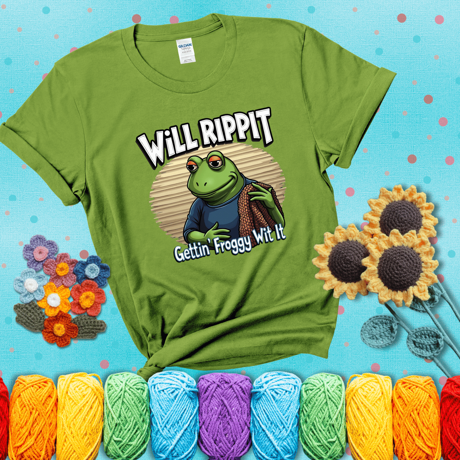 Cool frog with sunglasses, surrounded by yarn and hooks. Text reads: “Gettin’ Froggy Wit It.” A hip and humorous crochet tee for yarn lovers with rhythm, showing a bright green tee with a teal sunflower background