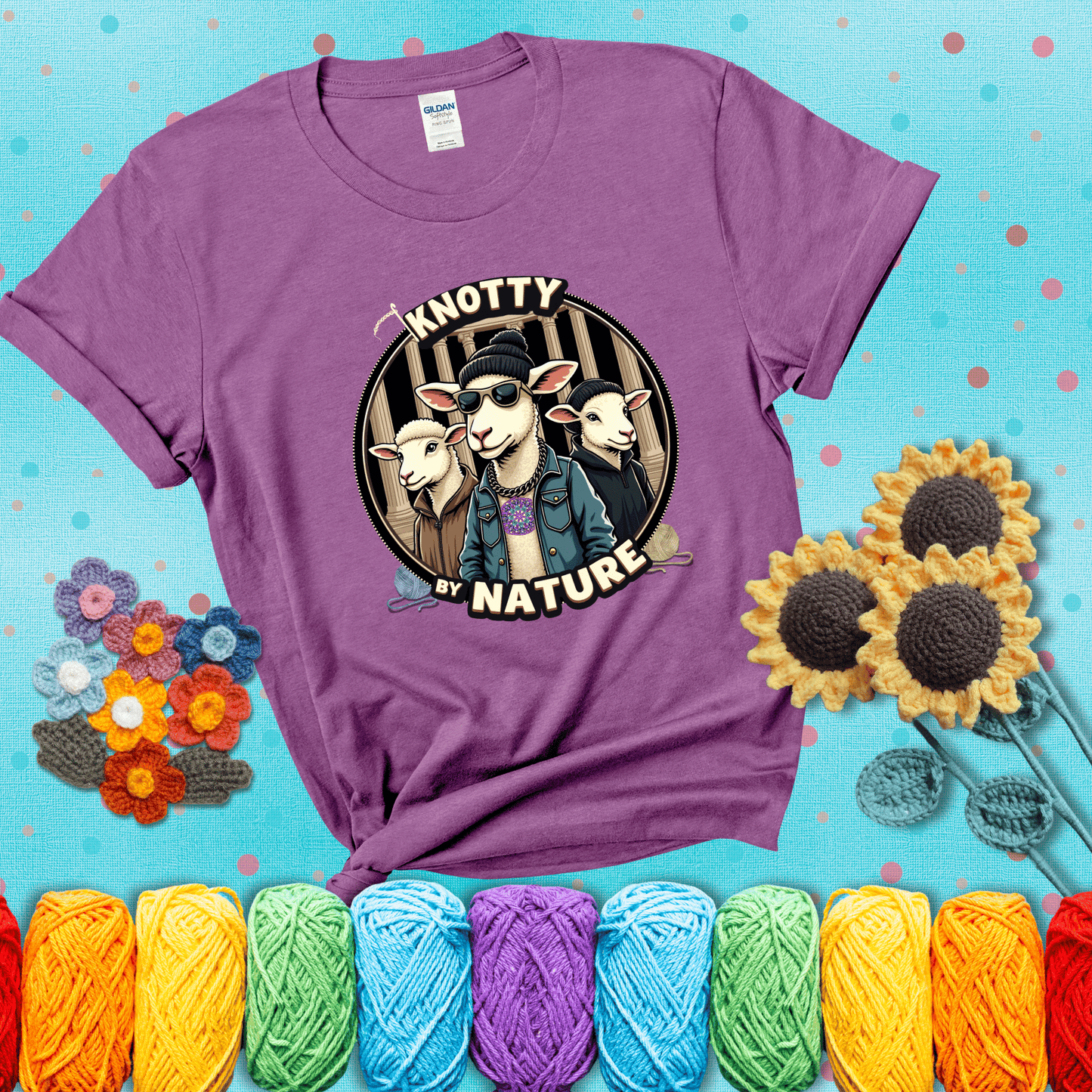 Three cool sheep dressed in urban streetwear pose in front of columns, with bold text “Knotty By Nature,” a hilarious crochet parody with swagger showing a light purple tee with a teal sunflower background