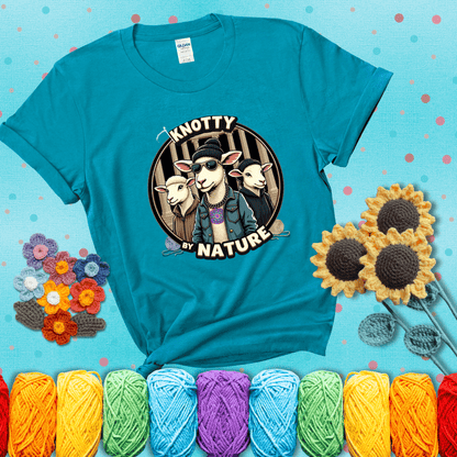 Three cool sheep dressed in urban streetwear pose in front of columns, with bold text “Knotty By Nature,” a hilarious crochet parody with swagger showing a blue-green tee with a teal sunflower background