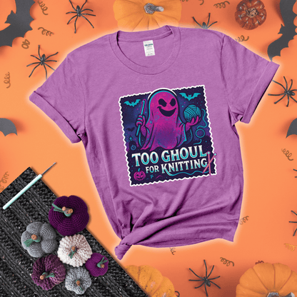 A spooky ghost holds a yarn ball and crochet hook in a vibrant Halloween palette with bats, tombstones, and pumpkins wearing a light purple tee with a festive halloween background