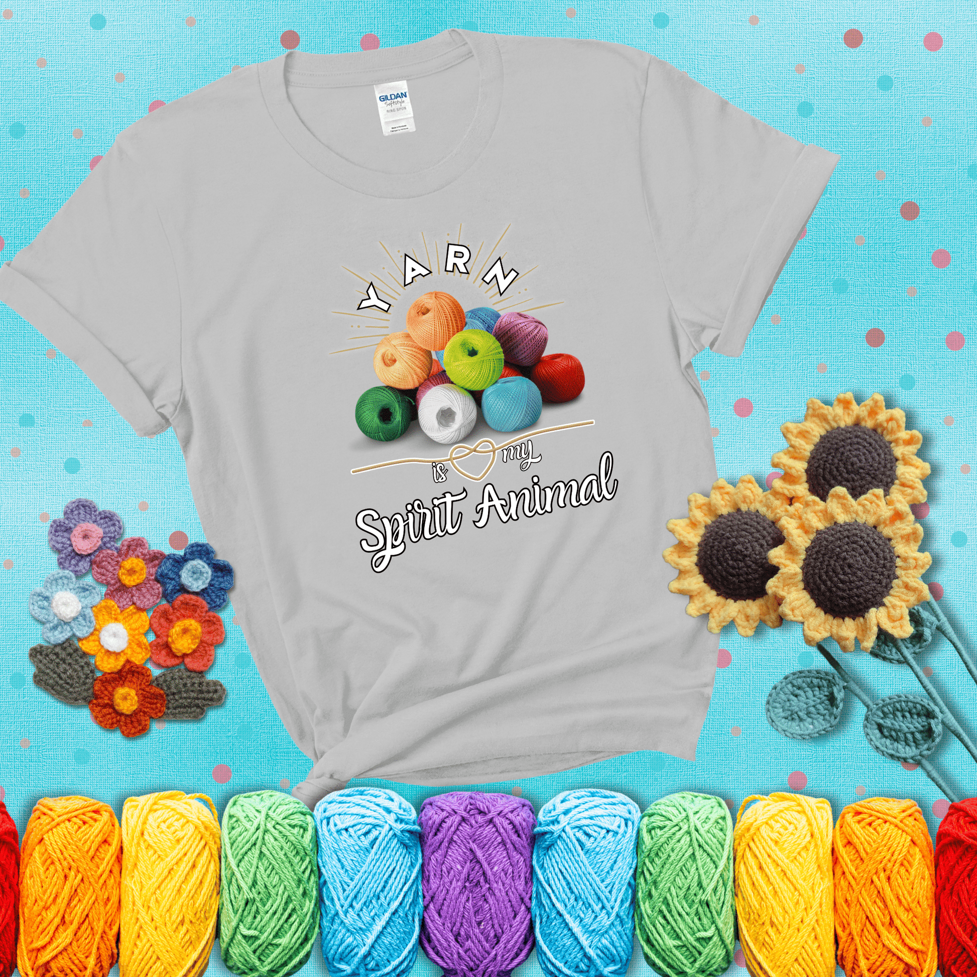 Stack of colorful yarn balls with radiant glow. Text reads: “Yarn Is My Spirit Animal.” A calming and colorful tee for fiber lovers who find zen in stitching, showing a light grey tee with a teal sunflower background